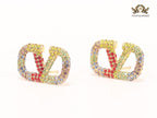 Alphabet V multi coloured studs