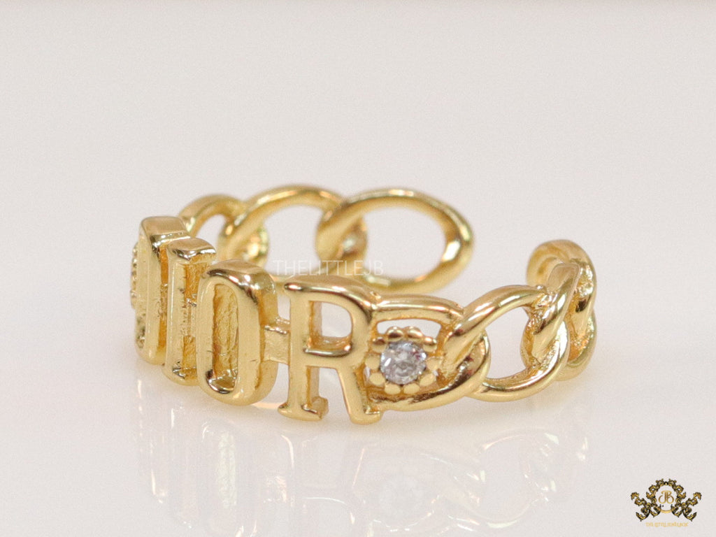 Gold plated alphabet open ring with white cz