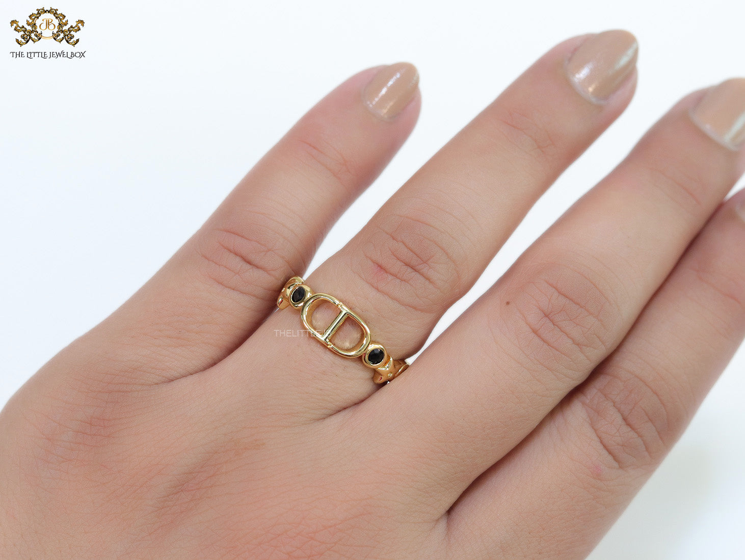 Gold finish alphabet open ring with black cz