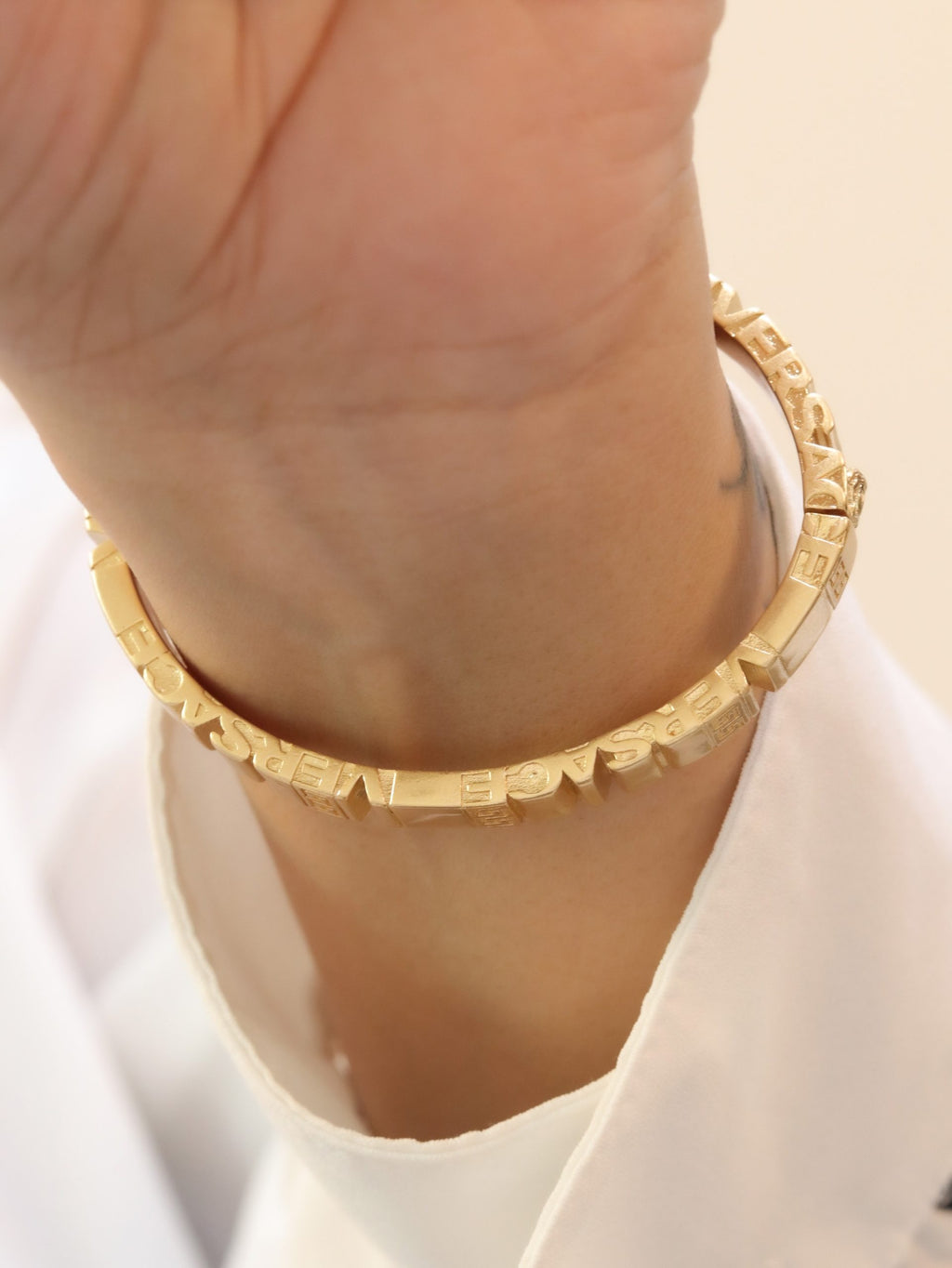 Medusa gold plated open bracelet