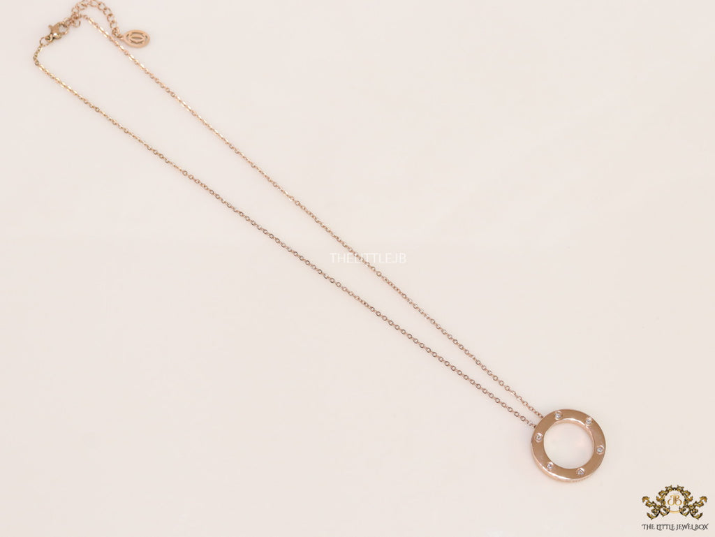 Rose gold plated disc shape pendant necklace with cz