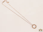 Rose gold plated disc shape pendant necklace with cz
