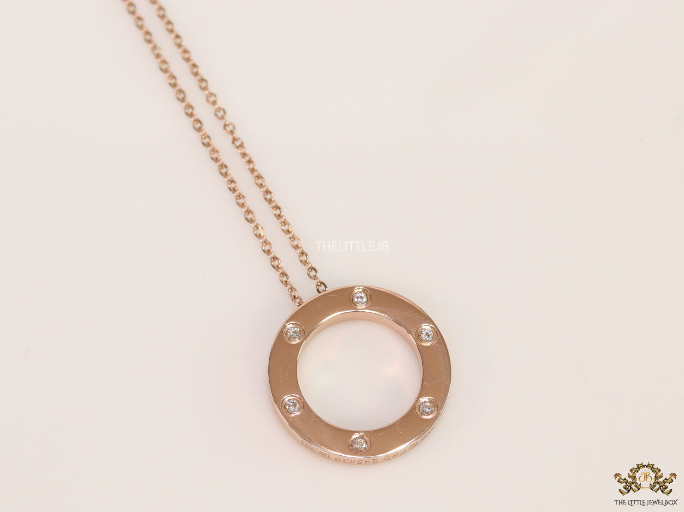 Rose gold plated disc shape pendant necklace with cz