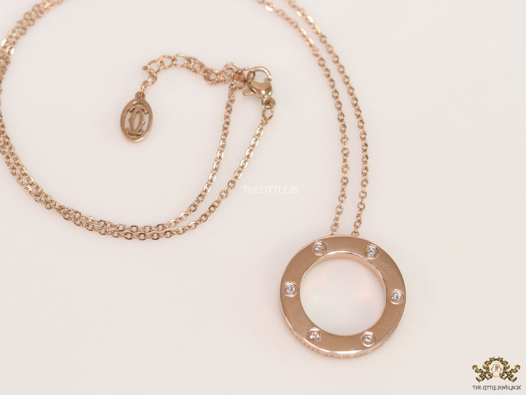 Rose gold plated disc shape pendant necklace with cz