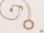 Rose gold plated disc shape pendant necklace with cz
