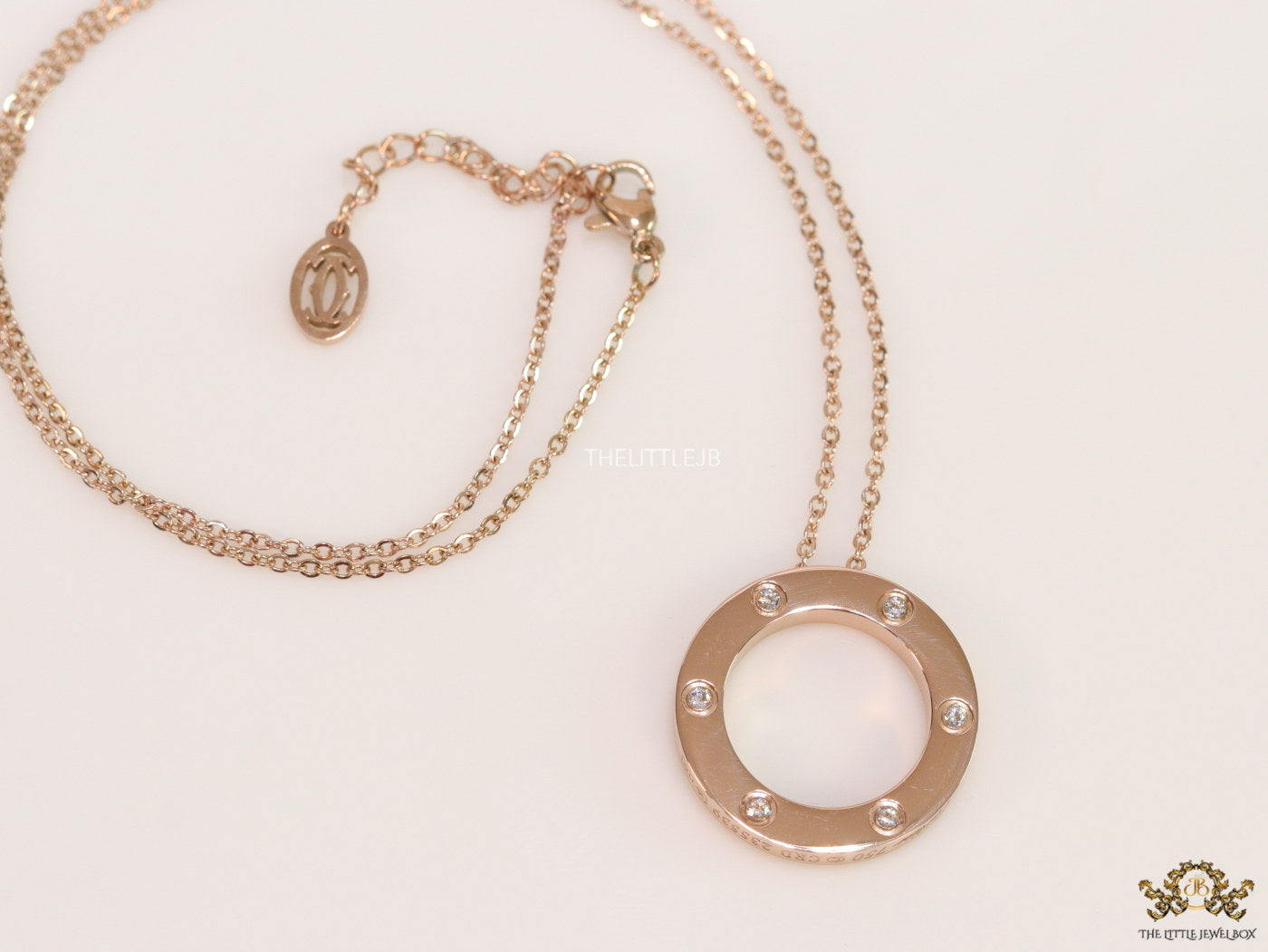 Rose gold plated disc shape pendant necklace with cz