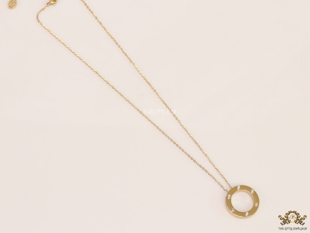 Gold plated disc shape pendant necklace with cz