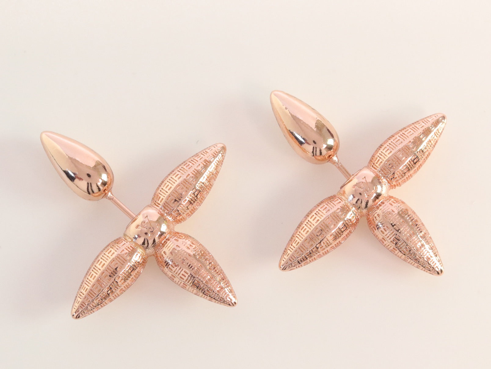 Rose gold cross studs
