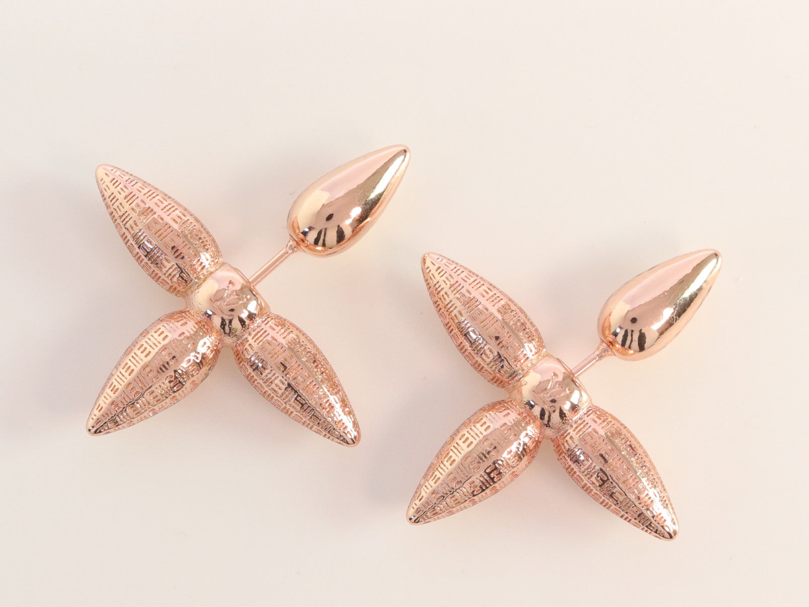 Rose gold cross studs