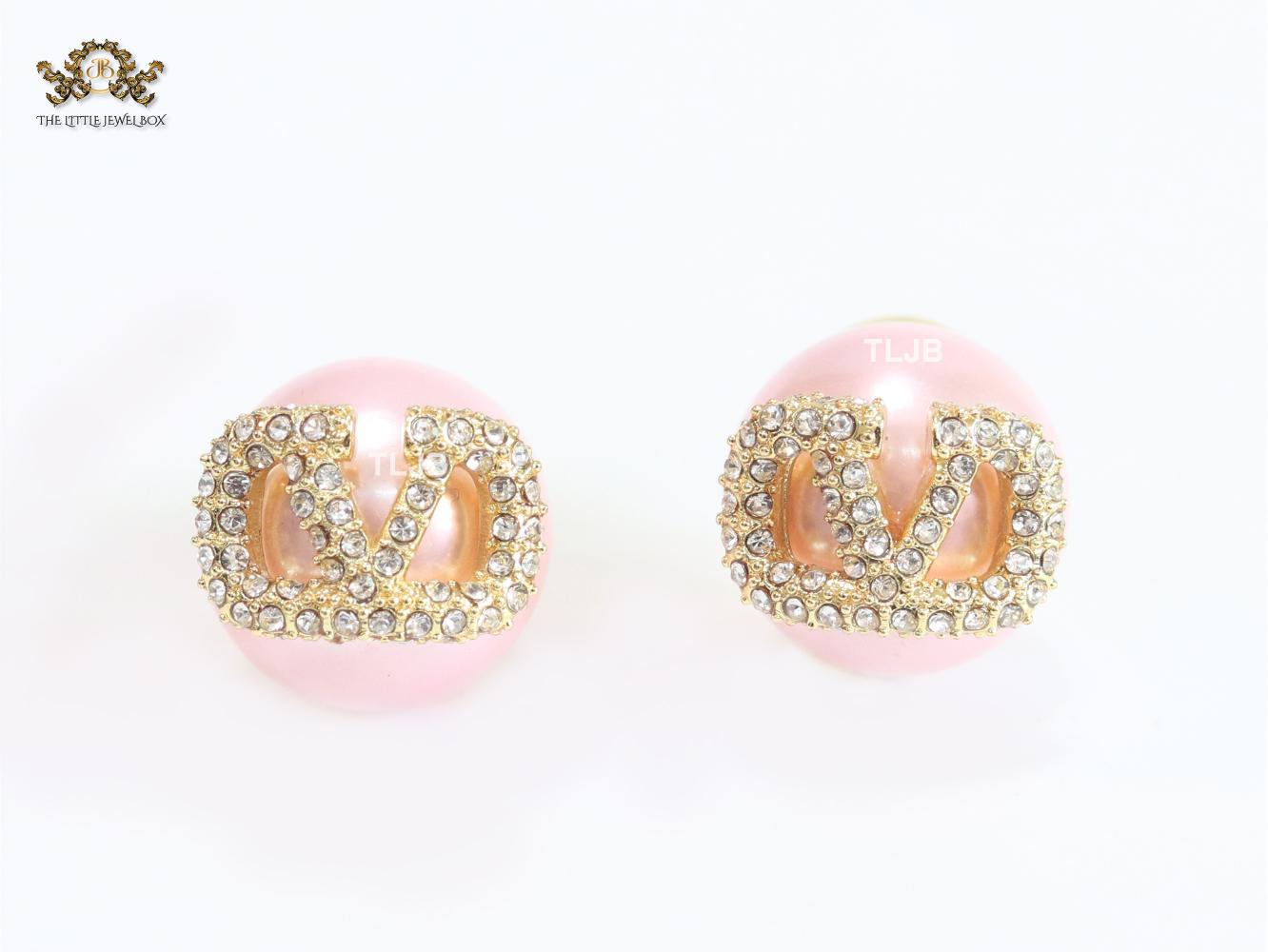 Pink pearl open studs