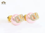 Pink pearl open studs