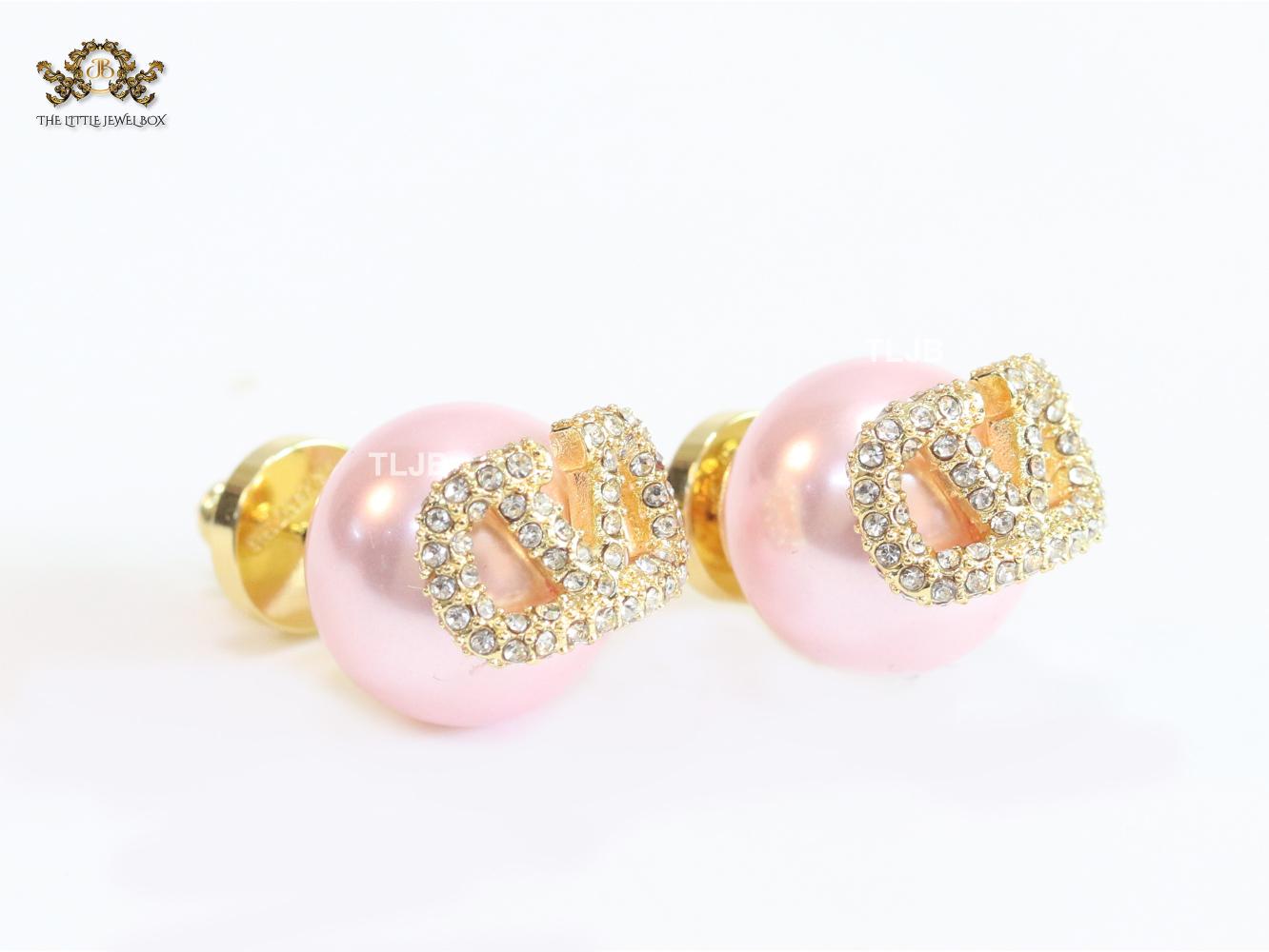 Pink pearl open studs