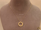Gold plated disc shape pendant necklace with cz