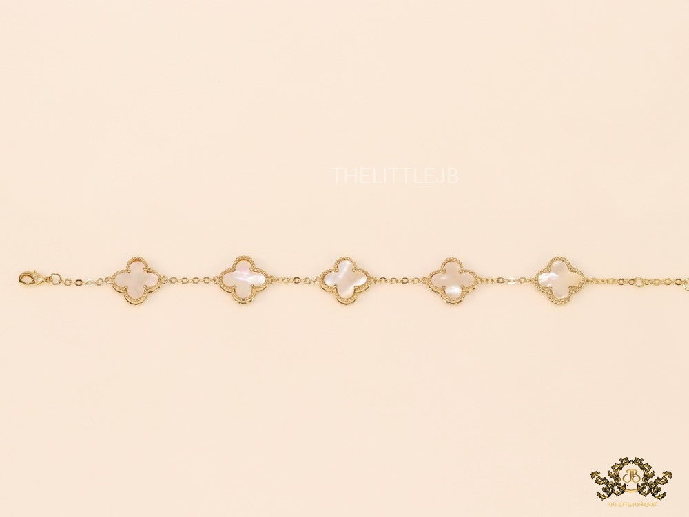 Gold plated chain bracelet with mother of pearl clover