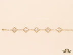 Gold plated chain bracelet with mother of pearl clover