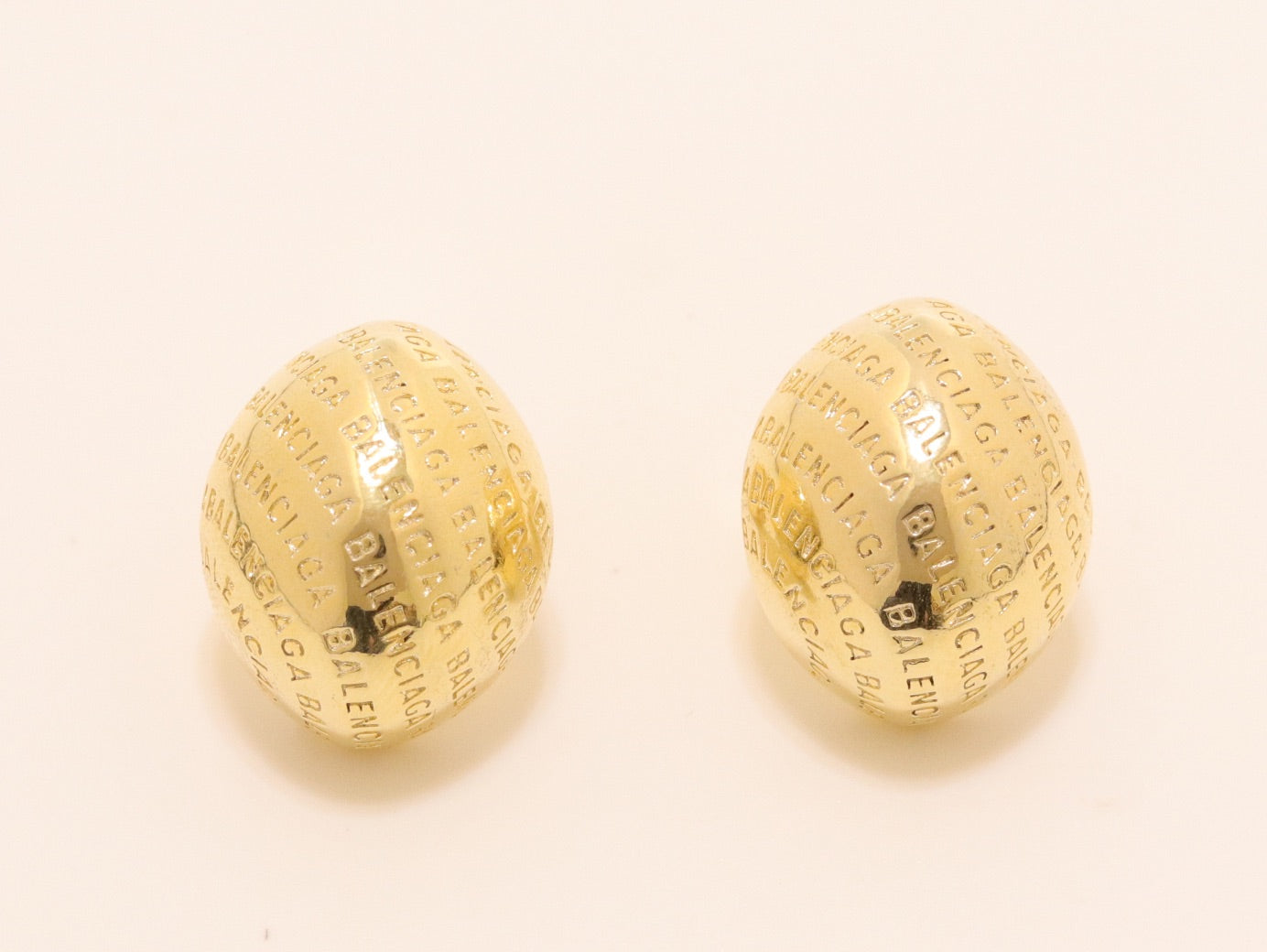 Gold alphabet embossed studs