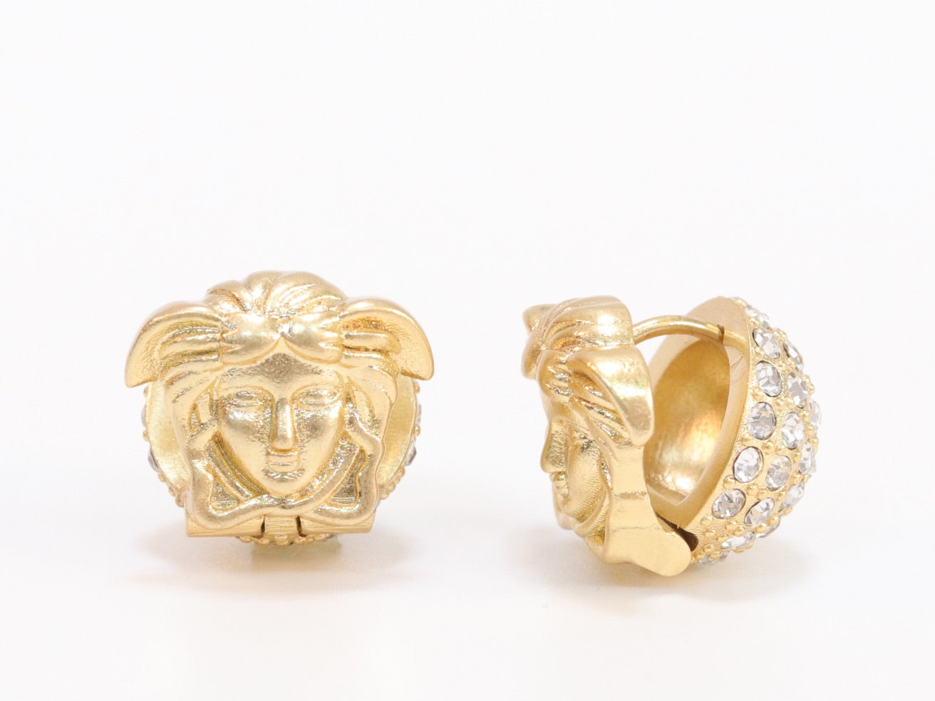 Reversible gold medusa studs with cz