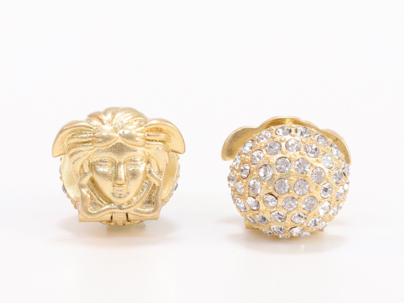 Reversible gold medusa studs with cz