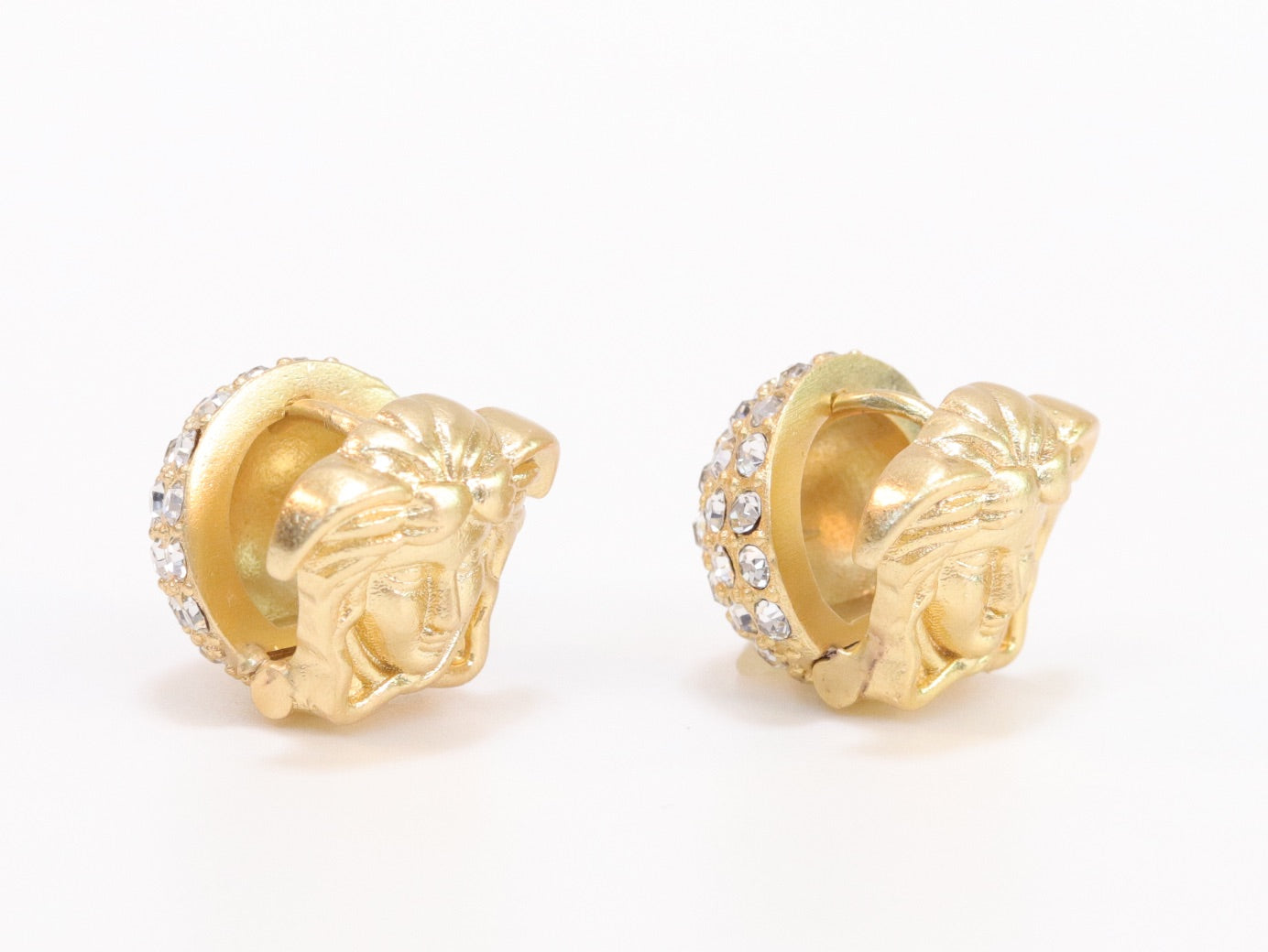 Reversible gold medusa studs with cz