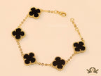 Gold plated chain bracelet with black clover
