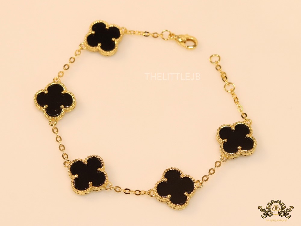 Gold plated chain bracelet with black clover