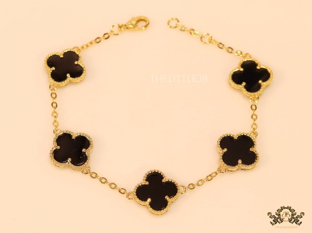 Gold plated chain bracelet with black clover