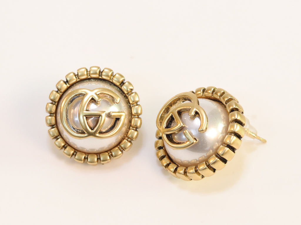 Double G rustic pearl studs