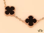 Rose gold plated chain bracelet with black clover