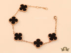 Rose gold plated chain bracelet with black clover