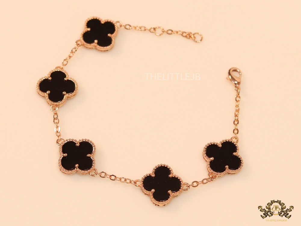Rose gold plated chain bracelet with black clover