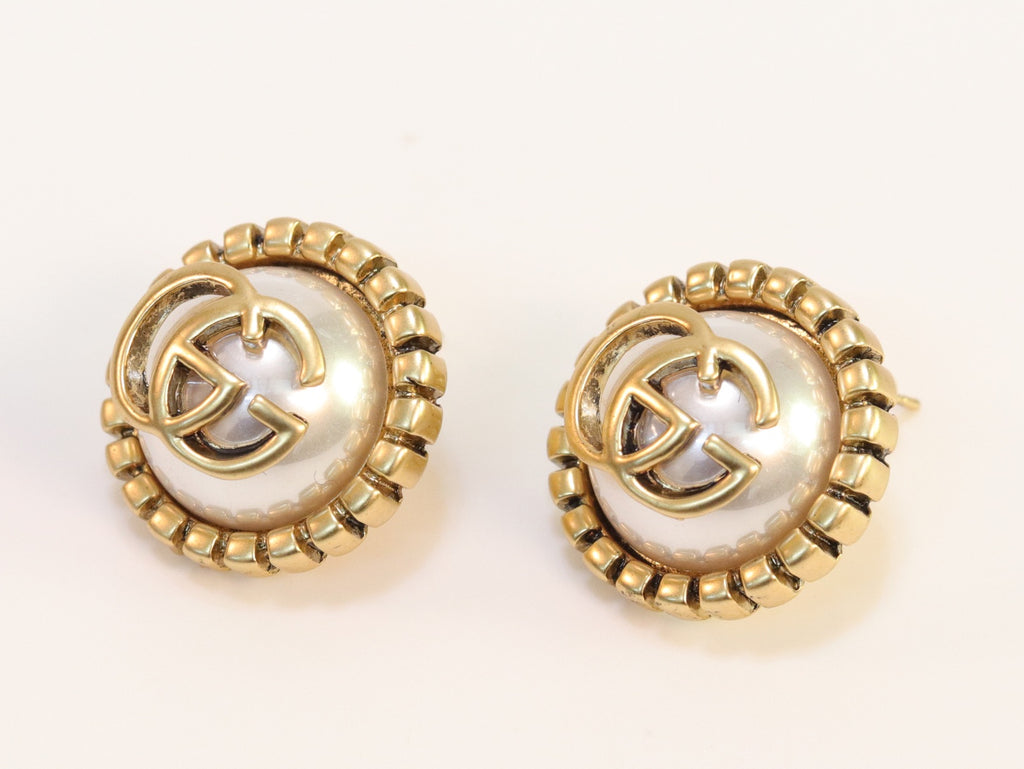 Double G rustic pearl studs
