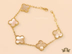 Gold plated chain bracelet with mother of pearl clover