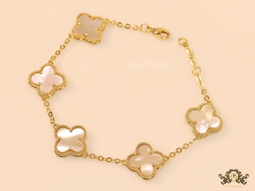 Gold plated chain bracelet with mother of pearl clover
