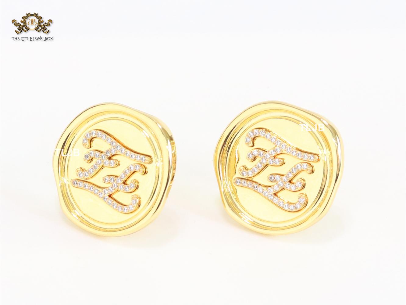 Double F studs with CZ