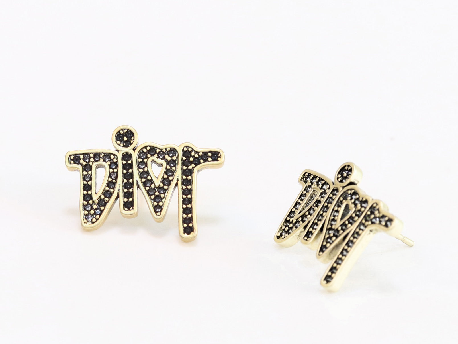 Gold Alphabet C and D earrings with black stones