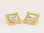 Square solitaires in gold boundaries with medusa