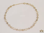 Choker style necklace with charms in gold finish