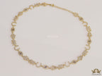 Choker style necklace with charms in gold finish
