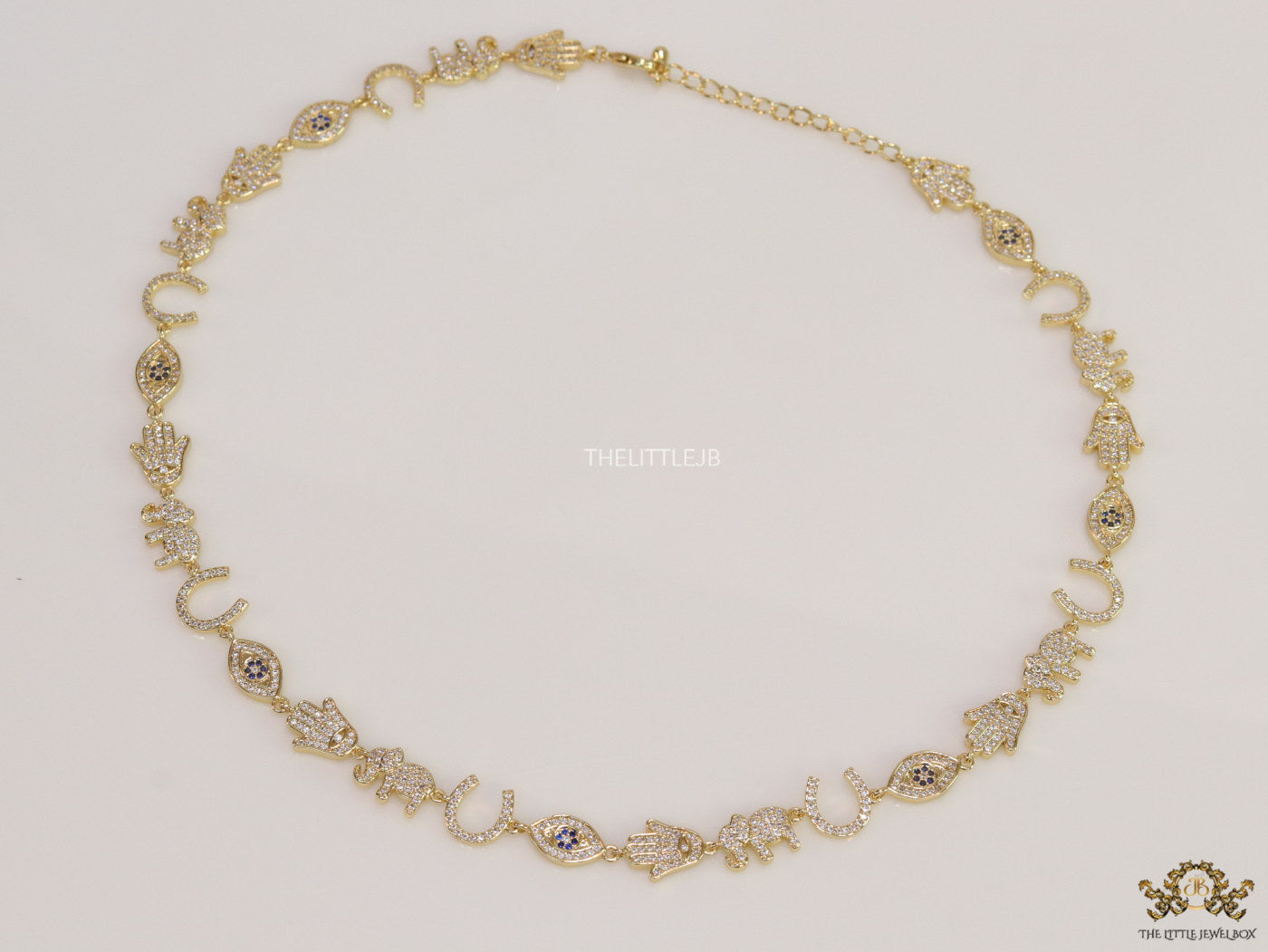 Choker style necklace with charms in gold finish