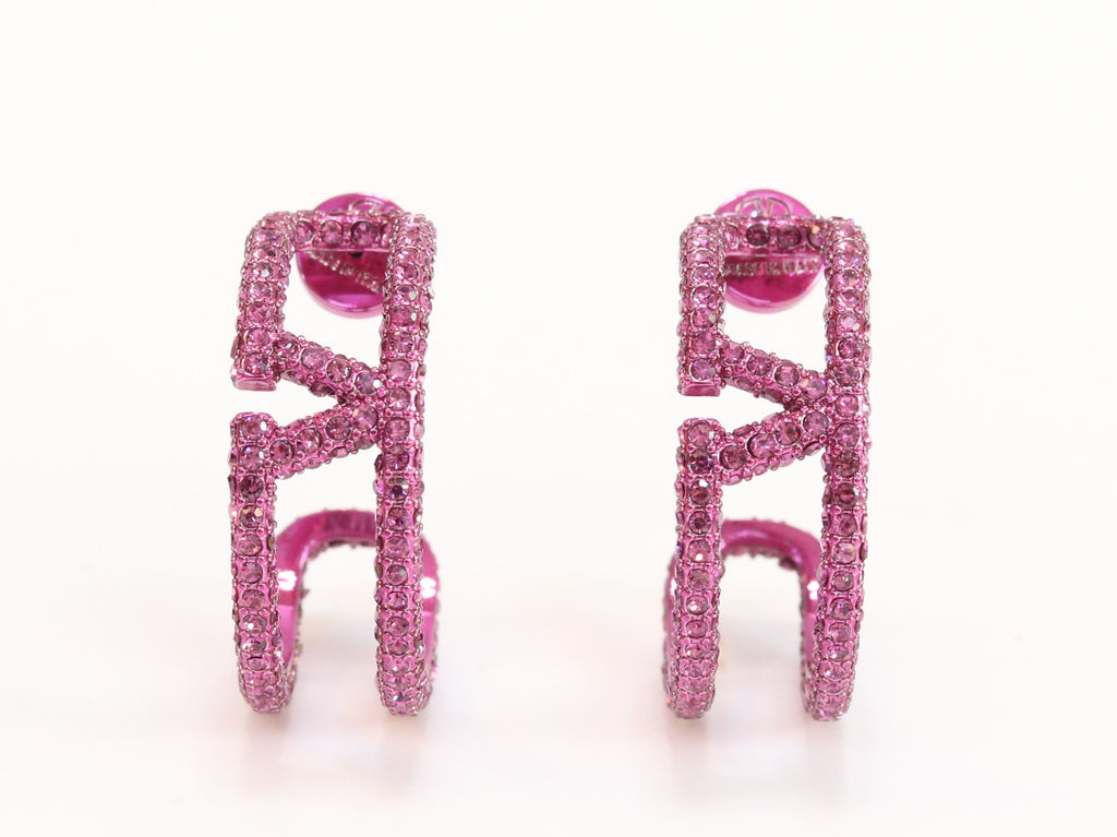 Pink curved open alphabet V hoops