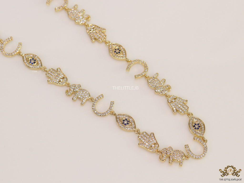 Choker style necklace with charms in gold finish