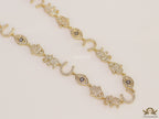 Choker style necklace with charms in gold finish