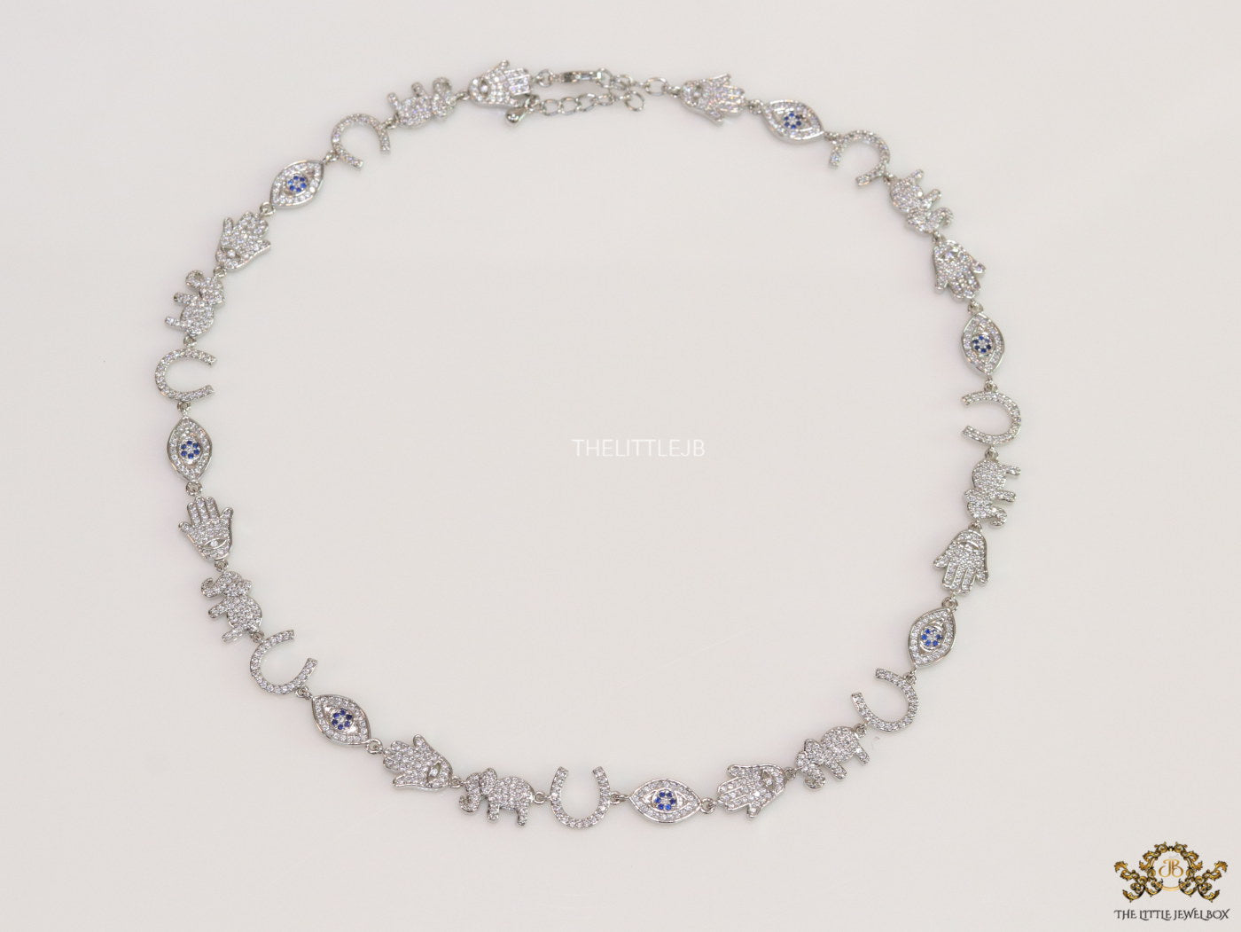 Choker style necklace with charms in platinum finish