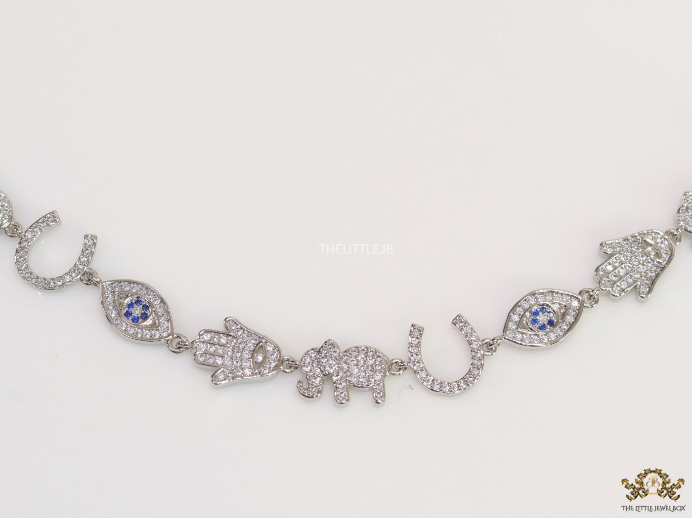 Choker style necklace with charms in platinum finish