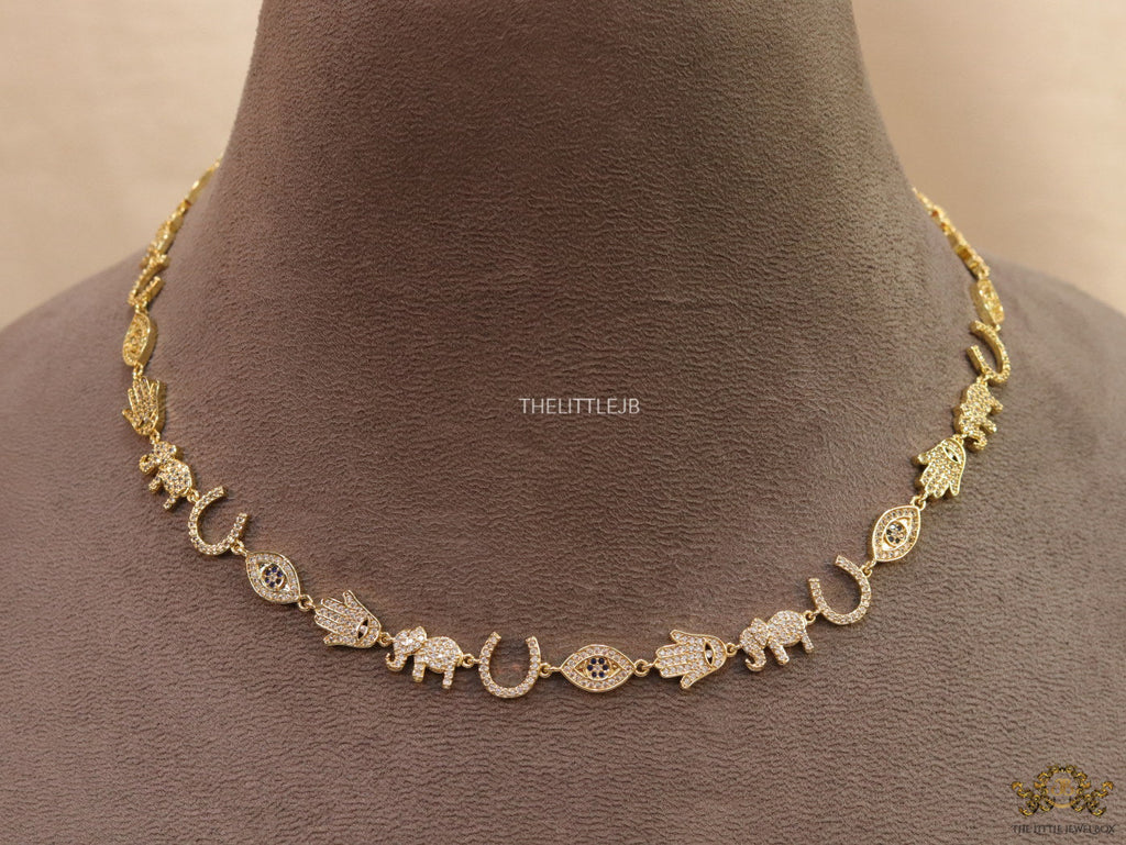 Choker style necklace with charms in gold finish