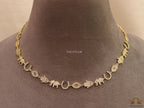 Choker style necklace with charms in gold finish