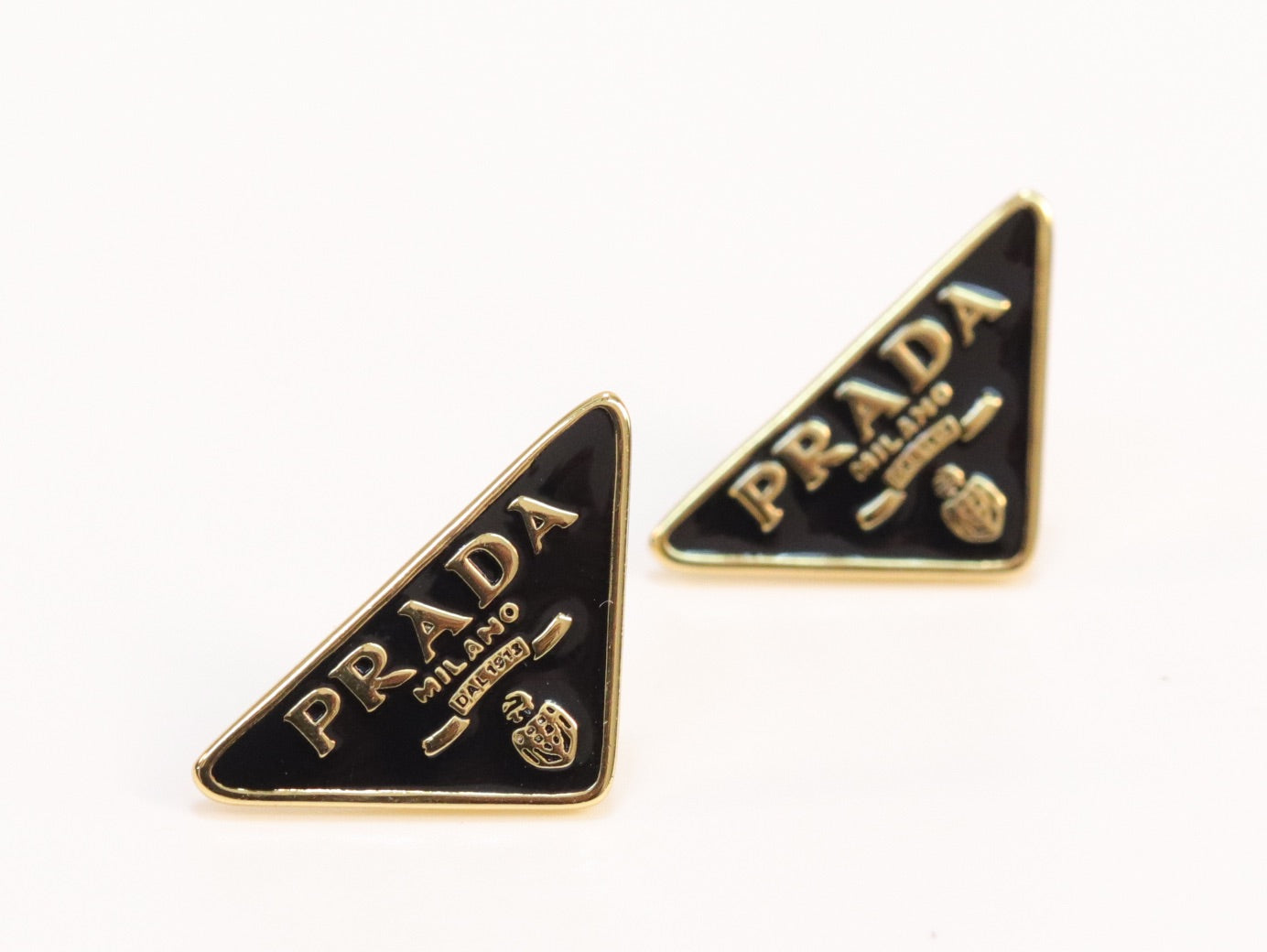 Black & gold enamel studs