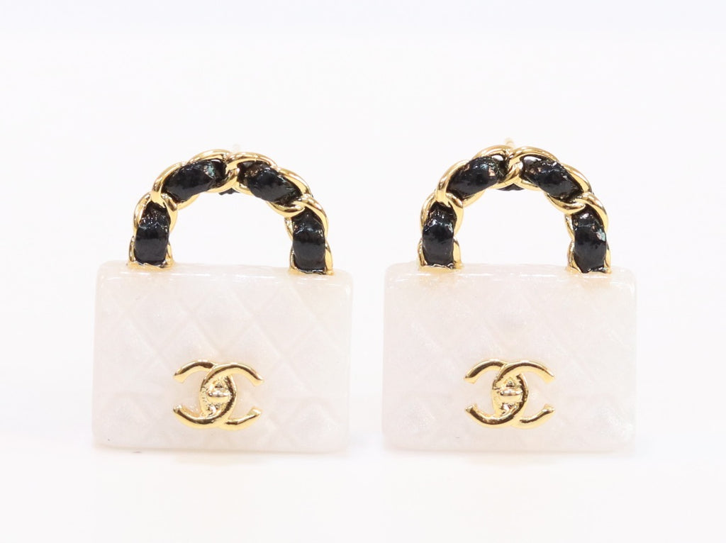 Black and white Double C purse earrings in gold