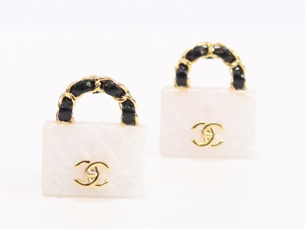 Black and white Double C purse earrings in gold