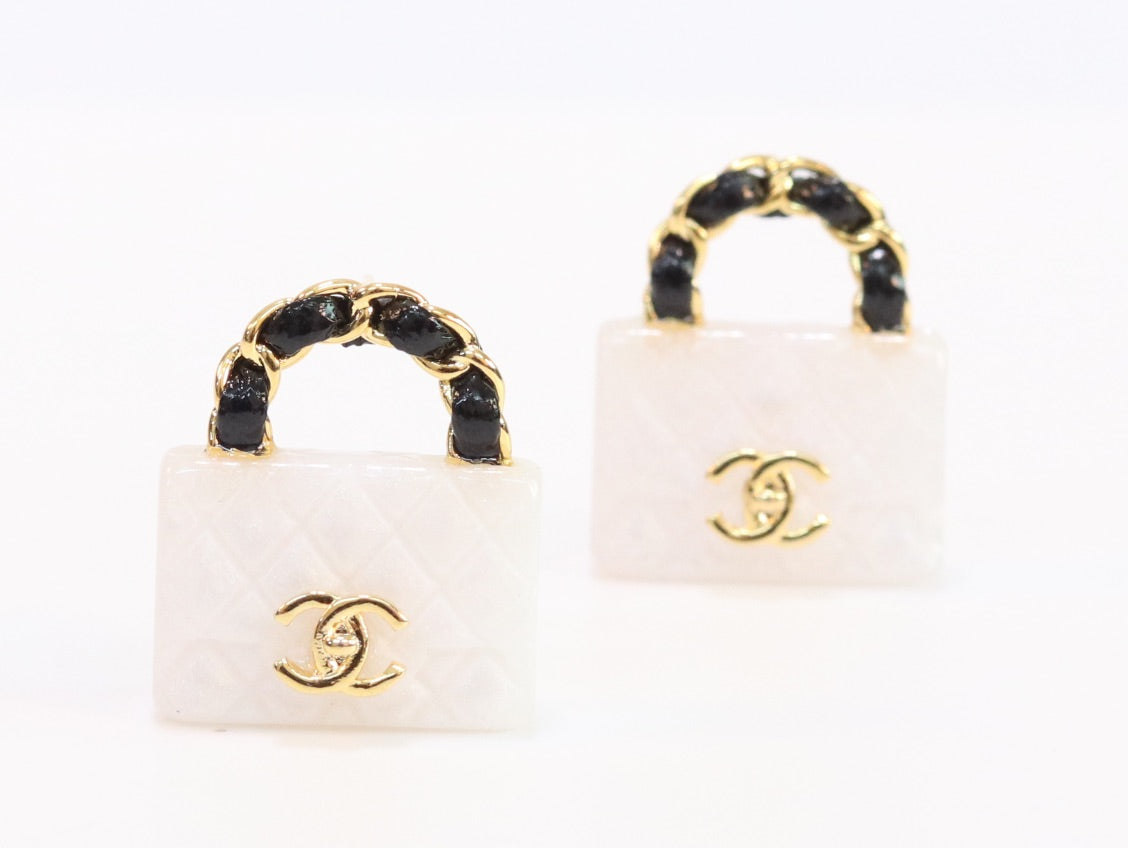 Black and white Double C purse earrings in gold